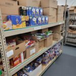 shelves of food like pasta and hamburger helper